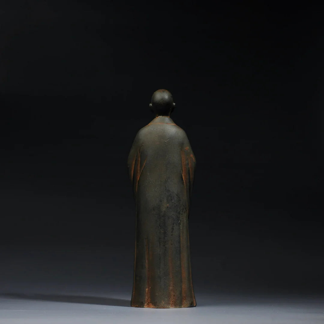 Close-up detail of Zen monk statue handcrafted Buddhist art sculpture