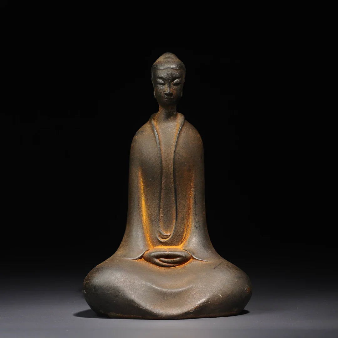 Zen Buddha statue with natural sandstone texture – modern Buddhist sculpture for calm home atmosphere