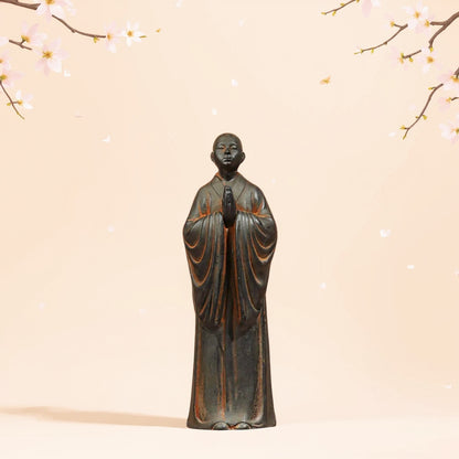 Zen standing monk statue displayed in meditation room peaceful home decor